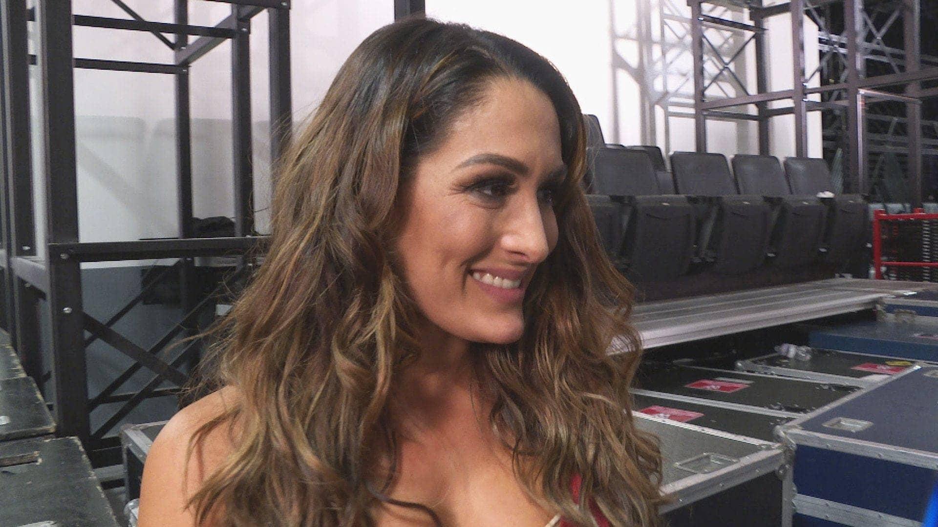 Nikki Bella Claps Back at Dating Rumors with NFL Star Coop