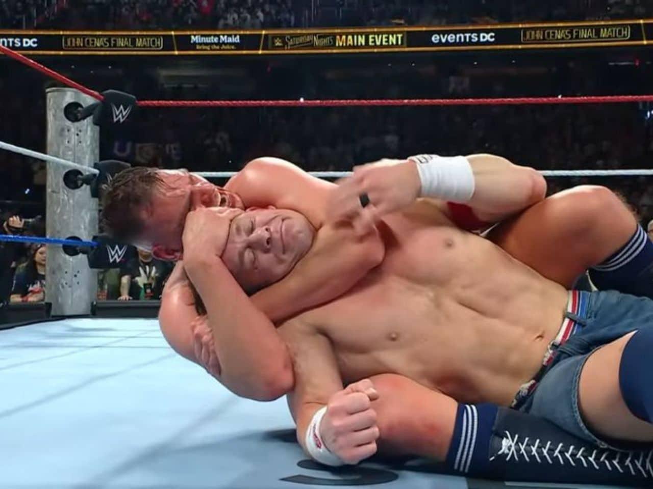 John Cena's cheeky smile before tapping out in big match