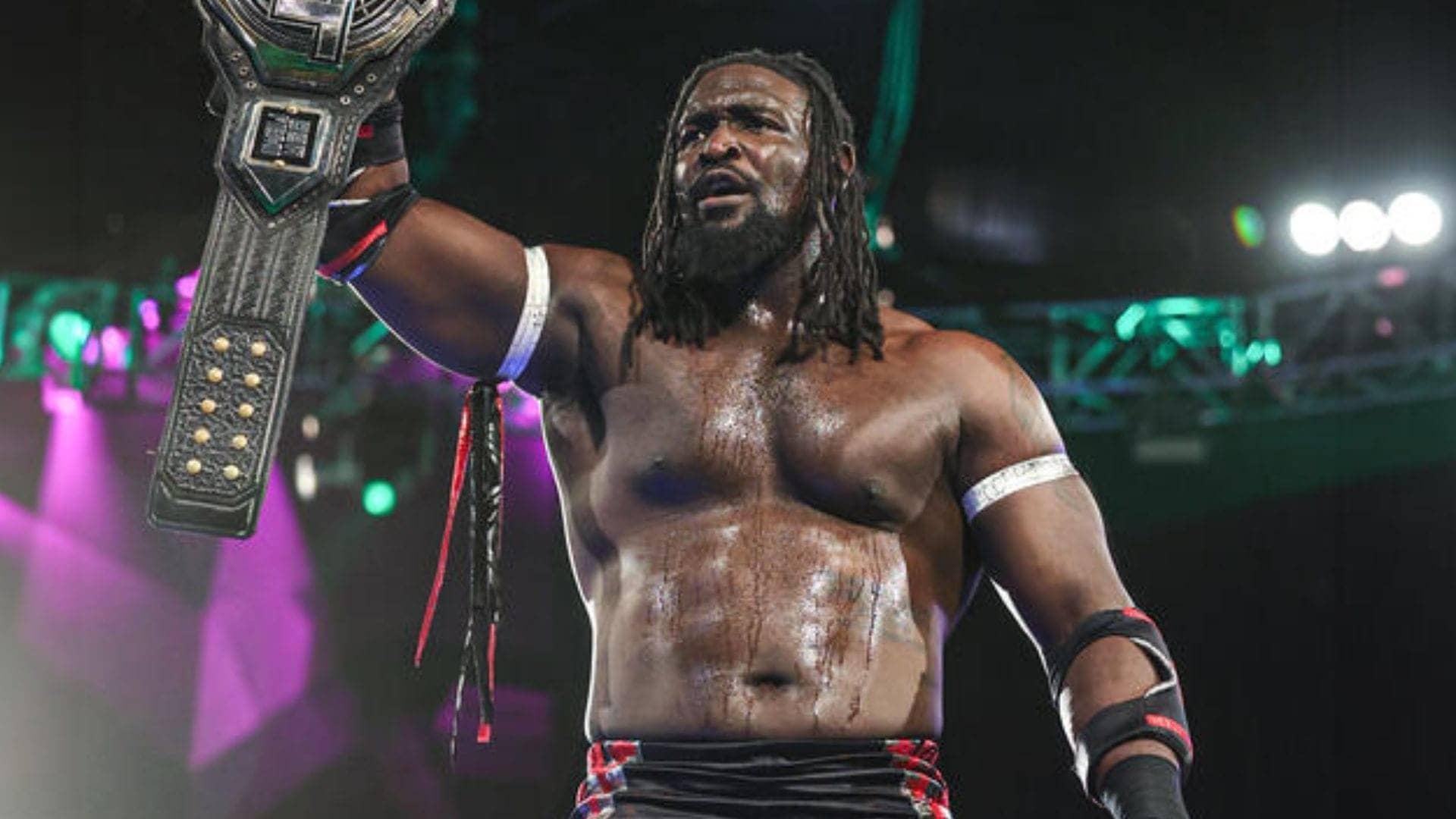 Oba Femi Takes Down WWE Champs Like a Boss on RAW